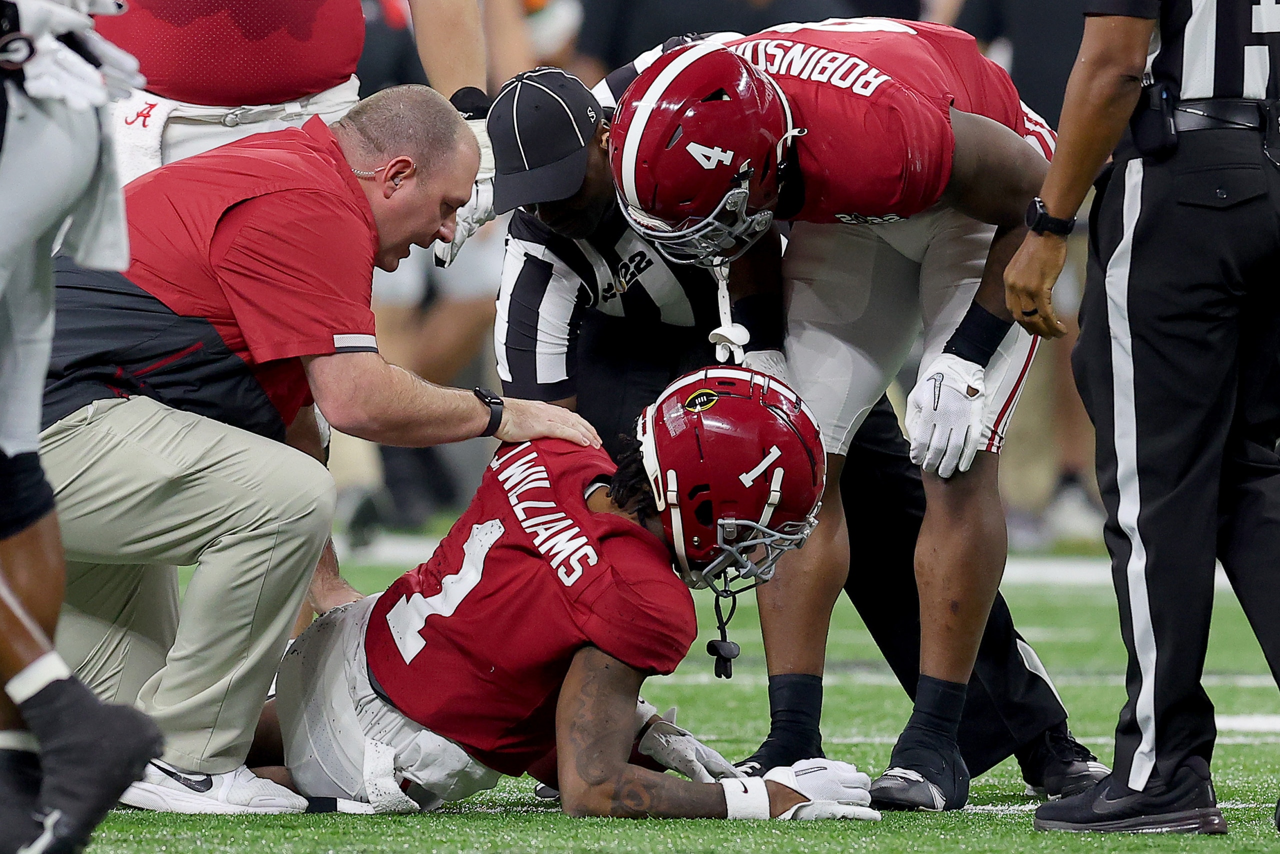 INDIANAPOLIS, INDIANA - JANUARY 10: Jameson Williams #1 of the Alabama Crimson Tide down on the field with an injury during the second quarter of the game against the Georgia Bulldogs during the 2022 CFP National Championship Game at Lucas Oil Stadium on January 10, 2022 in Indianapolis, Indiana. (Photo by Kevin C. Cox/Getty Images) INDIANAPOLIS, INDIANA - JANUARY 10: Jameson Williams #1 of the Alabama Crimson Tide down on the field with an injury during the second quarter of the game against the Georgia Bulldogs during the 2022 CFP National Championship Game at Lucas Oil Stadium on January 10, 2022 in Indianapolis, Indiana. (Photo by Kevin C. Cox/Getty Images)