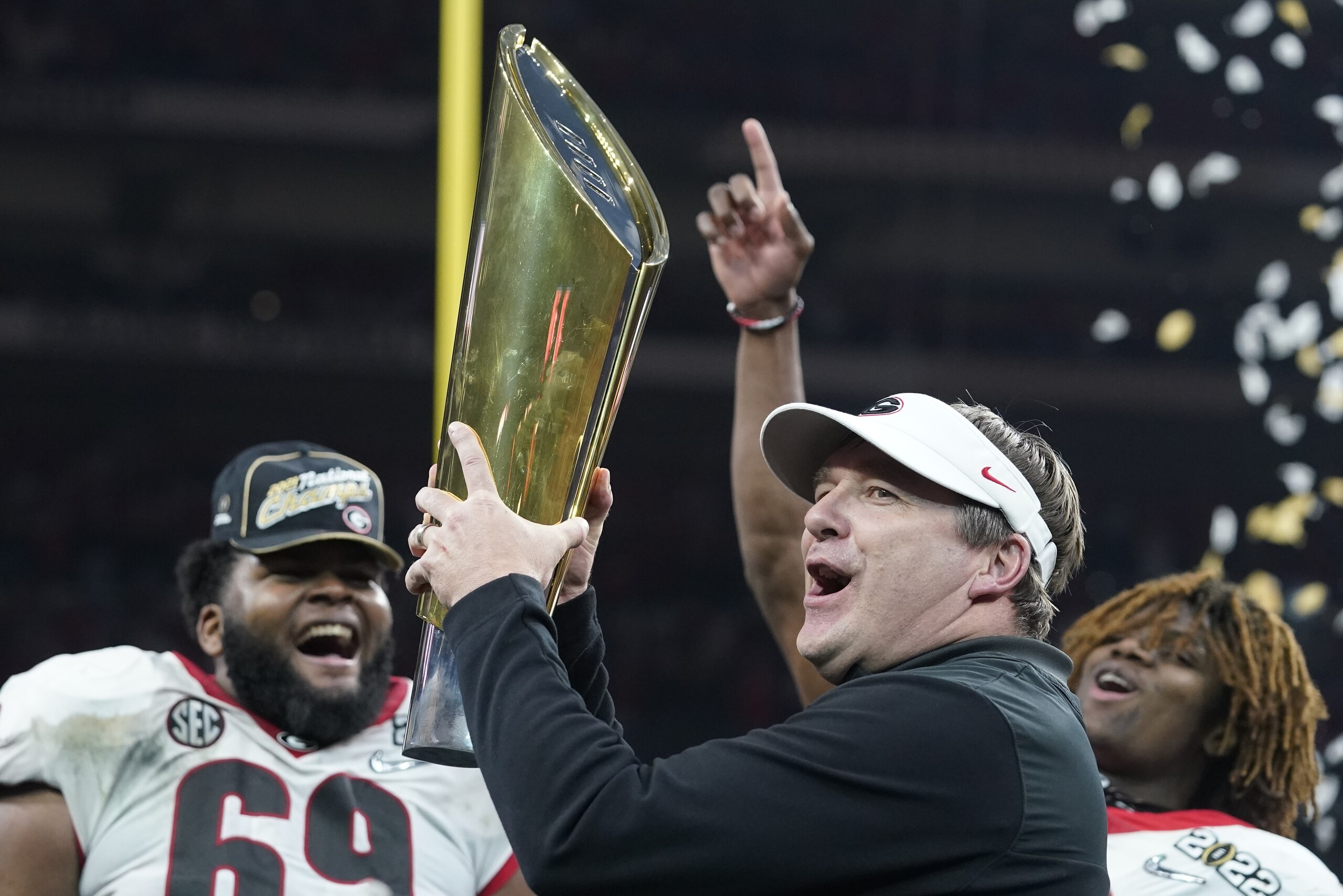 Georgia head coach Kirby Smart celebrates after the College Football Playoff championship football game against Alabama Tuesday, Jan. 11, 2022, in Indianapolis. Georgia won 33-18. (AP Photo/Darron Cummings) Georgia head coach Kirby Smart celebrates after the College Football Playoff championship football game against Alabama Tuesday, Jan. 11, 2022, in Indianapolis. Georgia won 33-18. (AP Photo/Darron Cummings)