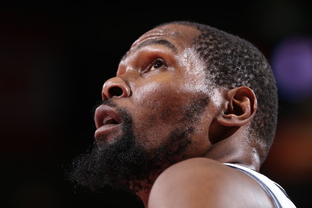 PORTLAND, OR - JANUARY 10: Kevin Durant #7 of the Brooklyn Nets looks on during the game against the Portland Trail Blazers on January 10, 2022 at the Moda Center Arena in Portland, Oregon. NOTE TO USER: User expressly acknowledges and agrees that, by downloading and or using this photograph, user is consenting to the terms and conditions of the Getty Images License Agreement. Mandatory Copyright Notice: Copyright 2022 NBAE (Photo by Sam Forencich/NBAE via Getty Images)