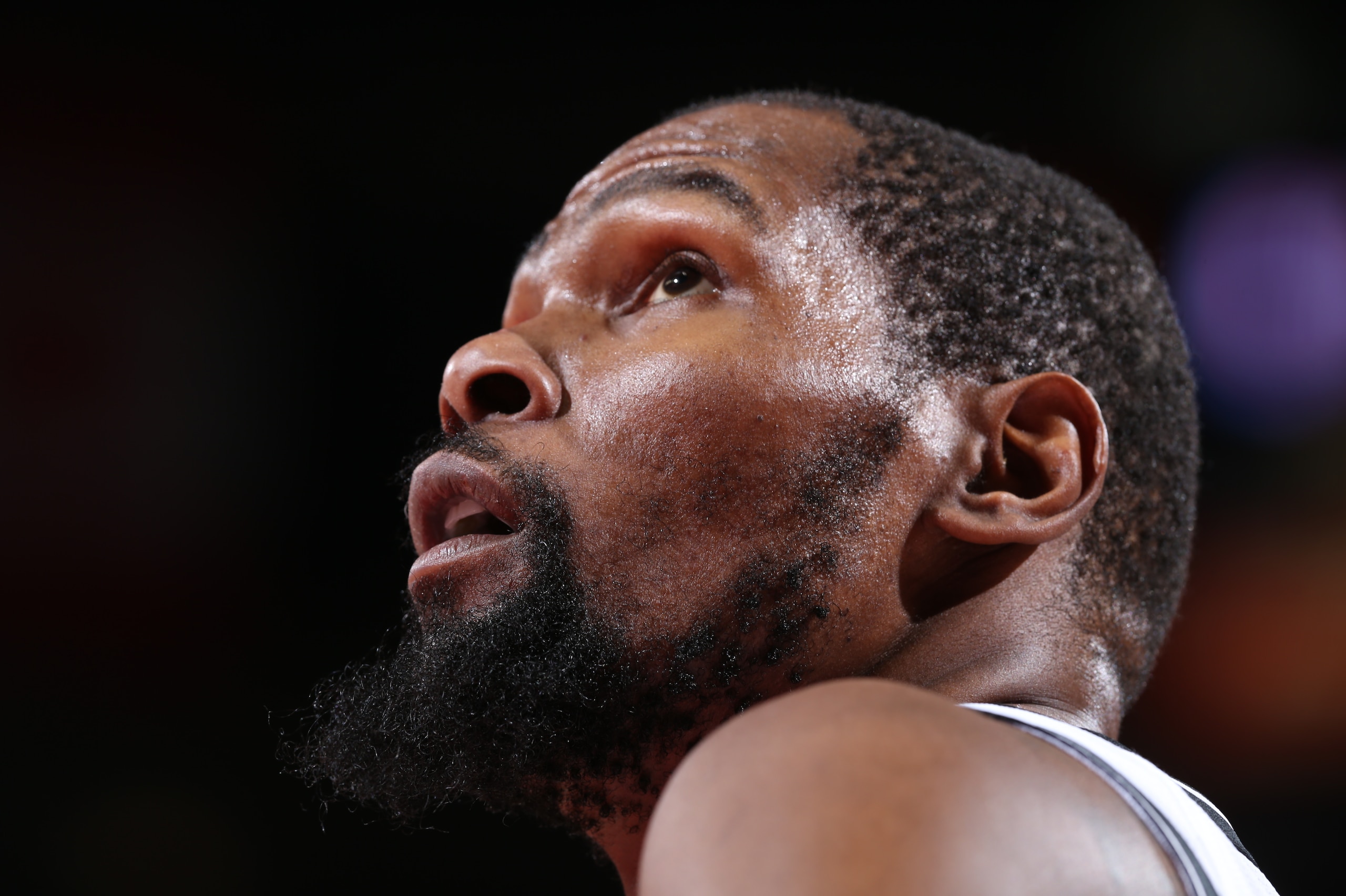 PORTLAND, OR - JANUARY 10: Kevin Durant #7 of the Brooklyn Nets looks on during the game against the Portland Trail Blazers on January 10, 2022 at the Moda Center Arena in Portland, Oregon. NOTE TO USER: User expressly acknowledges and agrees that, by downloading and or using this photograph, user is consenting to the terms and conditions of the Getty Images License Agreement. Mandatory Copyright Notice: Copyright 2022 NBAE (Photo by Sam Forencich/NBAE via Getty Images)