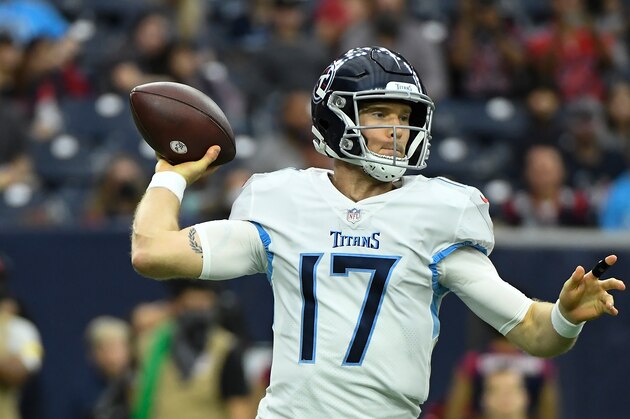 Tennessee Titans quarterback Ryan Tannehill (17) throws the ball against the Houston Texans during the first half of an NFL football game Sunday, Jan. 9, 2022, in Houston. (AP Photo/Justin Rex)
