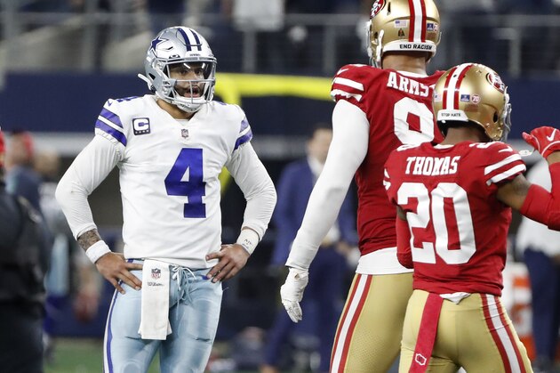 Dallas Cowboys quarterback Dak Prescott (4) reacts next to San Francisco 49ers defensive end Arik Armstead, middle, and cornerback Ambry Thomas (20) after the final play of an NFL wild-card playoff football game in Arlington, Texas, Sunday, Jan. 16, 2022. (AP Photo/Roger Steinman)