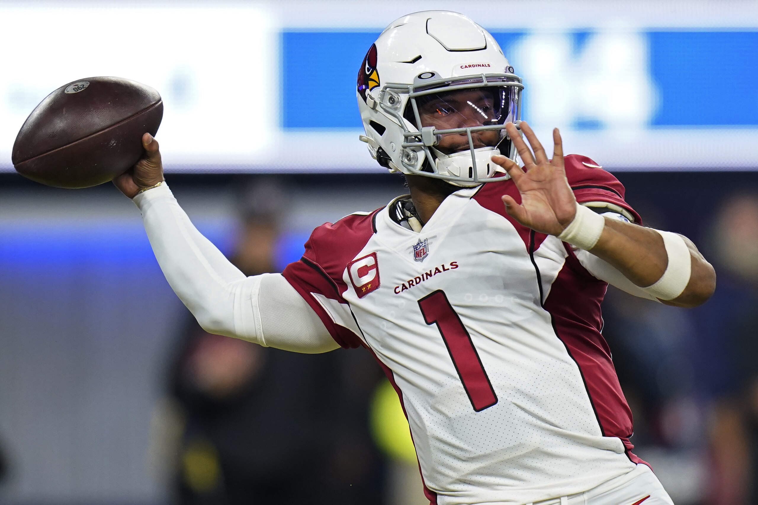 Arizona Cardinals quarterback Kyler Murray (1) passes against the Los Angeles Rams during the first half of an NFL wild-card playoff football game in Inglewood, Calif., Monday, Jan. 17, 2022. (AP Photo/Jae C. Hong) Arizona Cardinals quarterback Kyler Murray (1) passes against the Los Angeles Rams during the first half of an NFL wild-card playoff football game in Inglewood, Calif., Monday, Jan. 17, 2022. (AP Photo/Jae C. Hong)