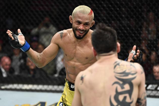 ANAHEIM, CALIFORNIA - JANUARY 22: (L-R) Deiveson Figueiredo of Brazil battles Brandon Moreno of Mexico in their UFC flyweight championship fight during the UFC 270 event at Honda Center on January 22, 2022 in Anaheim, California. (Photo by Chris Unger/Zuffa LLC)