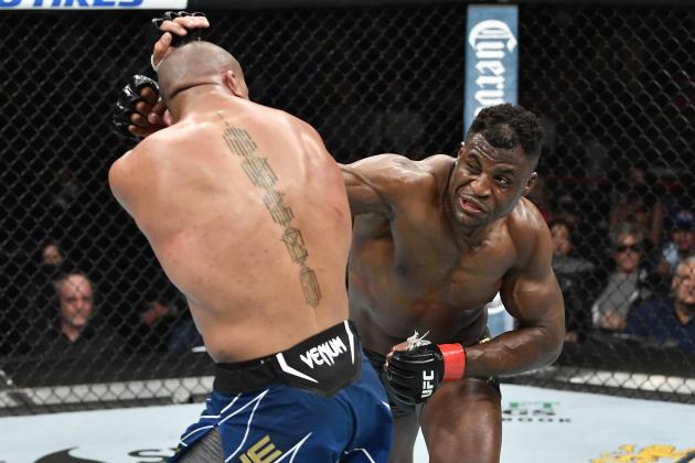 ANAHEIM, CALIFORNIA - JANUARY 22: (R-L) Francis Ngannou of Cameroon punches Ciryl Gane of France in their UFC heavyweight championship fight during the UFC 270 event at Honda Center on January 22, 2022 in Anaheim, California. (Photo by Chris Unger/Zuffa LLC)