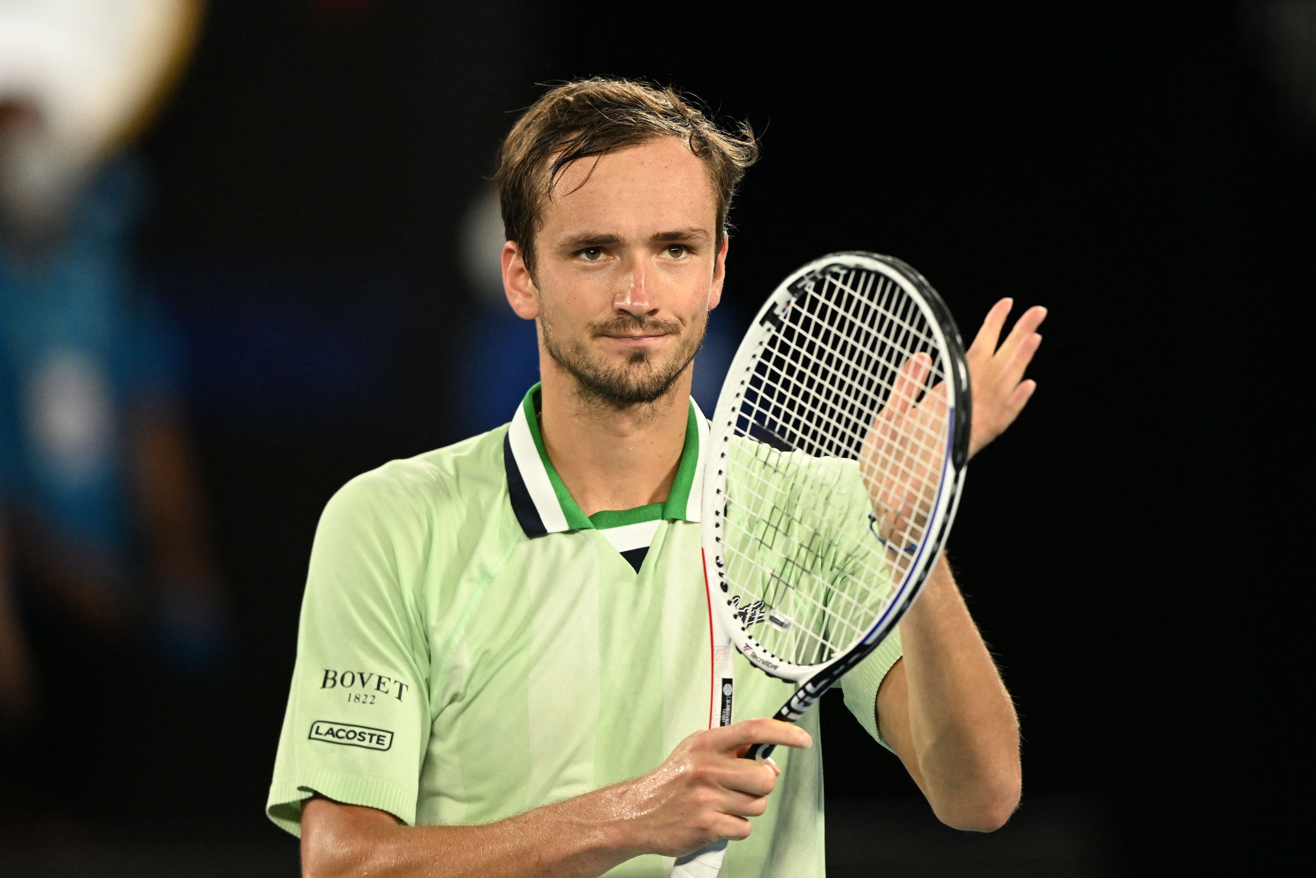 Russia's Daniil Medvedev celebrates after beating Greece's Stefanos Tsitsipas in their men's singles semi-final match on day twelve of the Australian Open tennis tournament in Melbourne on January 28, 2022. - -- IMAGE RESTRICTED TO EDITORIAL USE - STRICTLY NO COMMERCIAL USE -- (Photo by MICHAEL ERREY / AFP) / -- IMAGE RESTRICTED TO EDITORIAL USE - STRICTLY NO COMMERCIAL USE -- (Photo by MICHAEL ERREY/AFP via Getty Images)