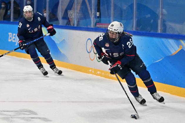 USA's Kendall Coyne Schofield carries the puck during the women's preliminary round group A match of the Beijing 2022 Winter Olympic Games ice hockey competition against players of Russia's Olympic Committee, at the Wukesong Sports Centre in Beijing on February 5, 2022. (Photo by ANTHONY WALLACE / AFP) (Photo by ANTHONY WALLACE/AFP via Getty Images)