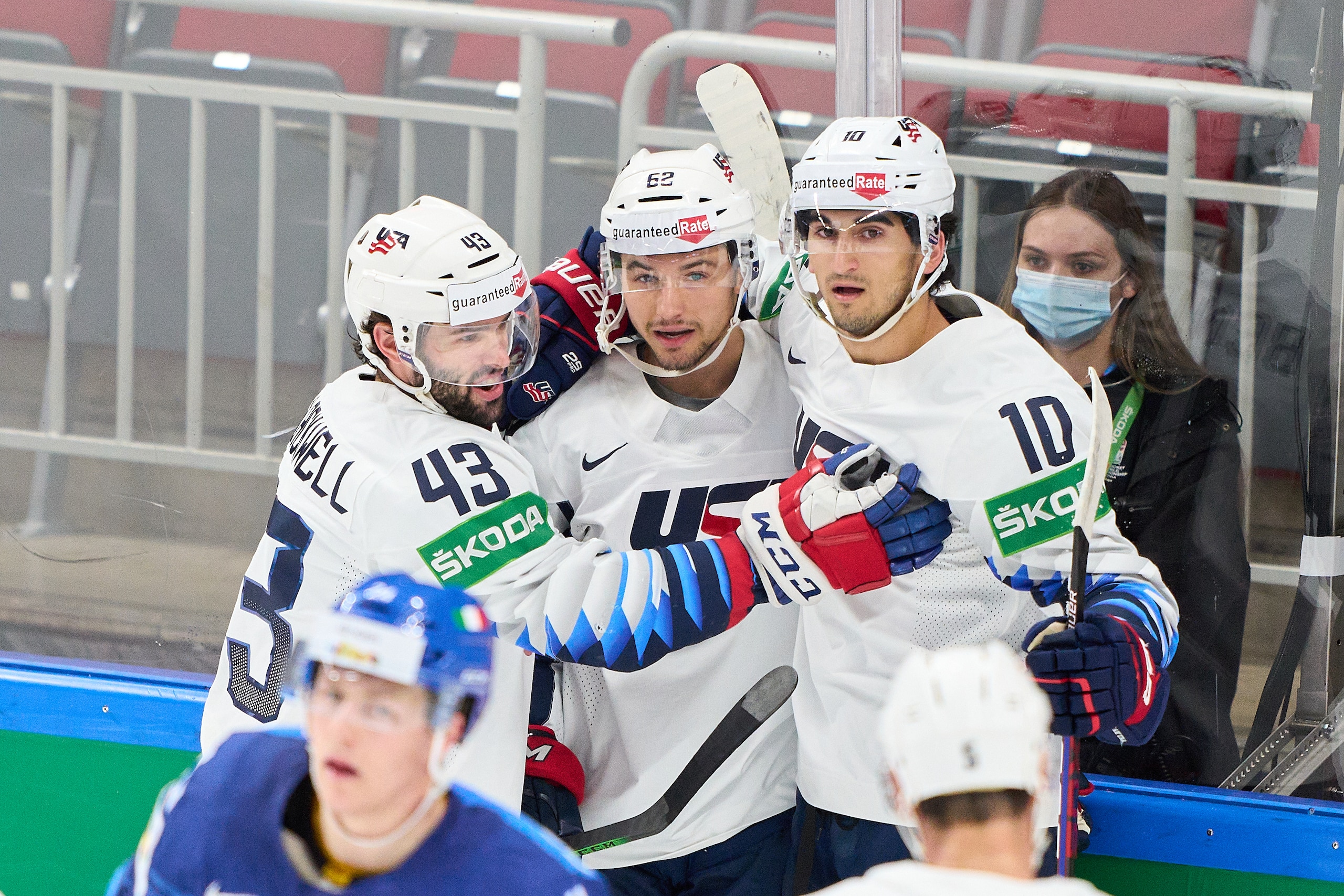RIGA, LATVIA - JUNE 01: Kevin Labanc (M) #62 of the United States celebrates scoring for 0-2 and celebrates his goal with Matty Beniers (R) #10 and Colin Blackwell (L) #43 of the United States during the 2021 IIHF Ice Hockey World Championship group stage game between Italy and United States at Arena Riga on June 1, 2021 in Riga, Latvia. (Photo by EyesWideOpen/Getty Images)
