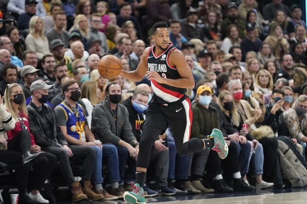 Portland Trail Blazers guard CJ McCollum (3) brings the ball up court in the first half during an NBA basketball game against the Utah Jazz Monday, Nov. 29, 2021, in Salt Lake City. (AP Photo/Rick Bowmer)