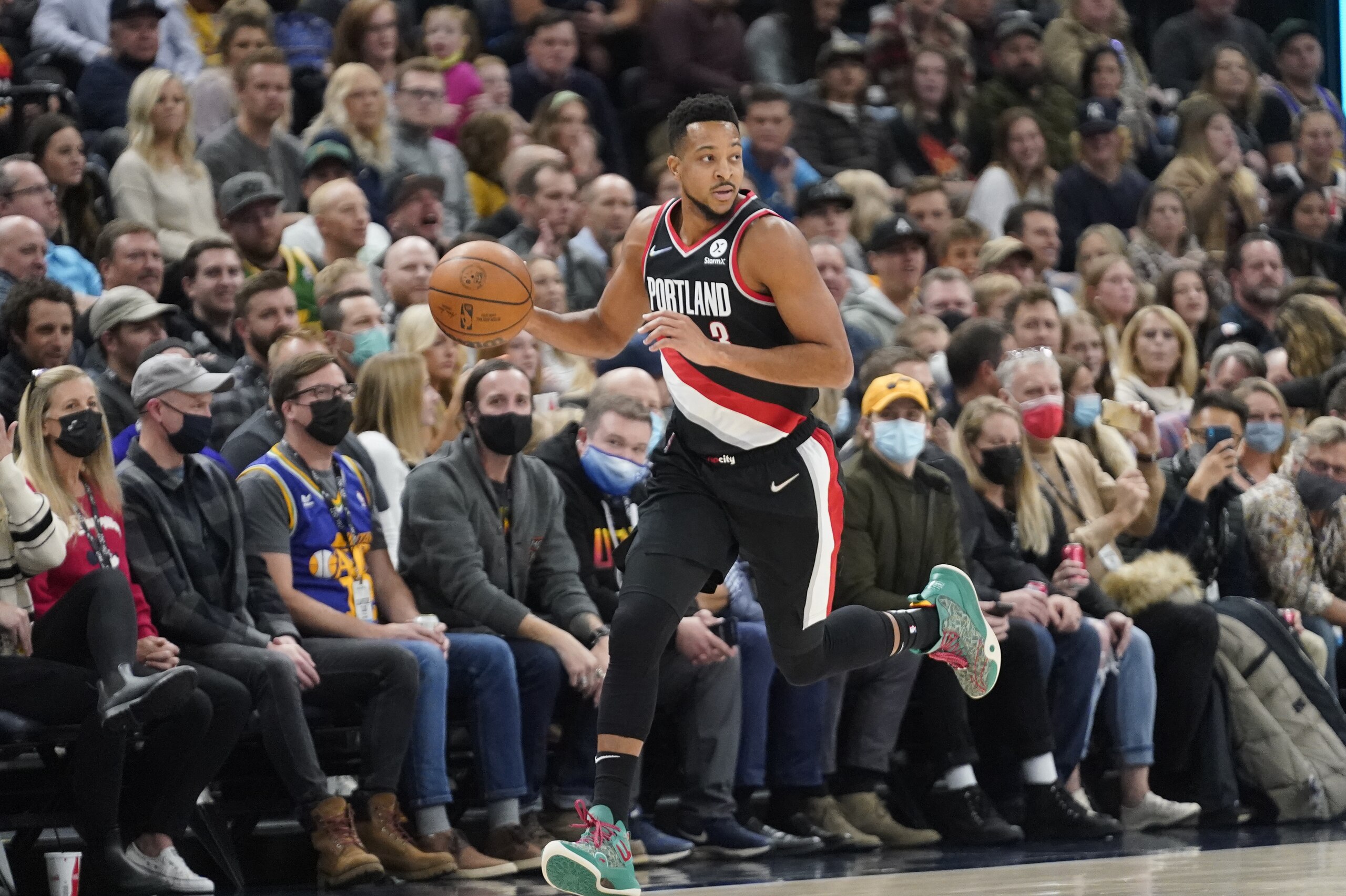 Portland Trail Blazers guard CJ McCollum (3) brings the ball up court in the first half during an NBA basketball game against the Utah Jazz Monday, Nov. 29, 2021, in Salt Lake City. (AP Photo/Rick Bowmer)
