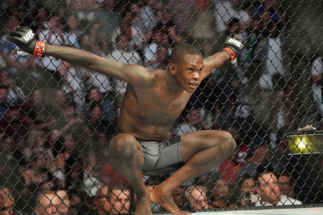 GLENDALE, AZ - JUNE 12: Israel Adesanya (red gloves) during UFC 263 on June 12, 2021, at Gila River Arena in Glendale, AZ. (Photo by Louis Grasse/PxImages/Icon Sportswire via Getty Images)
