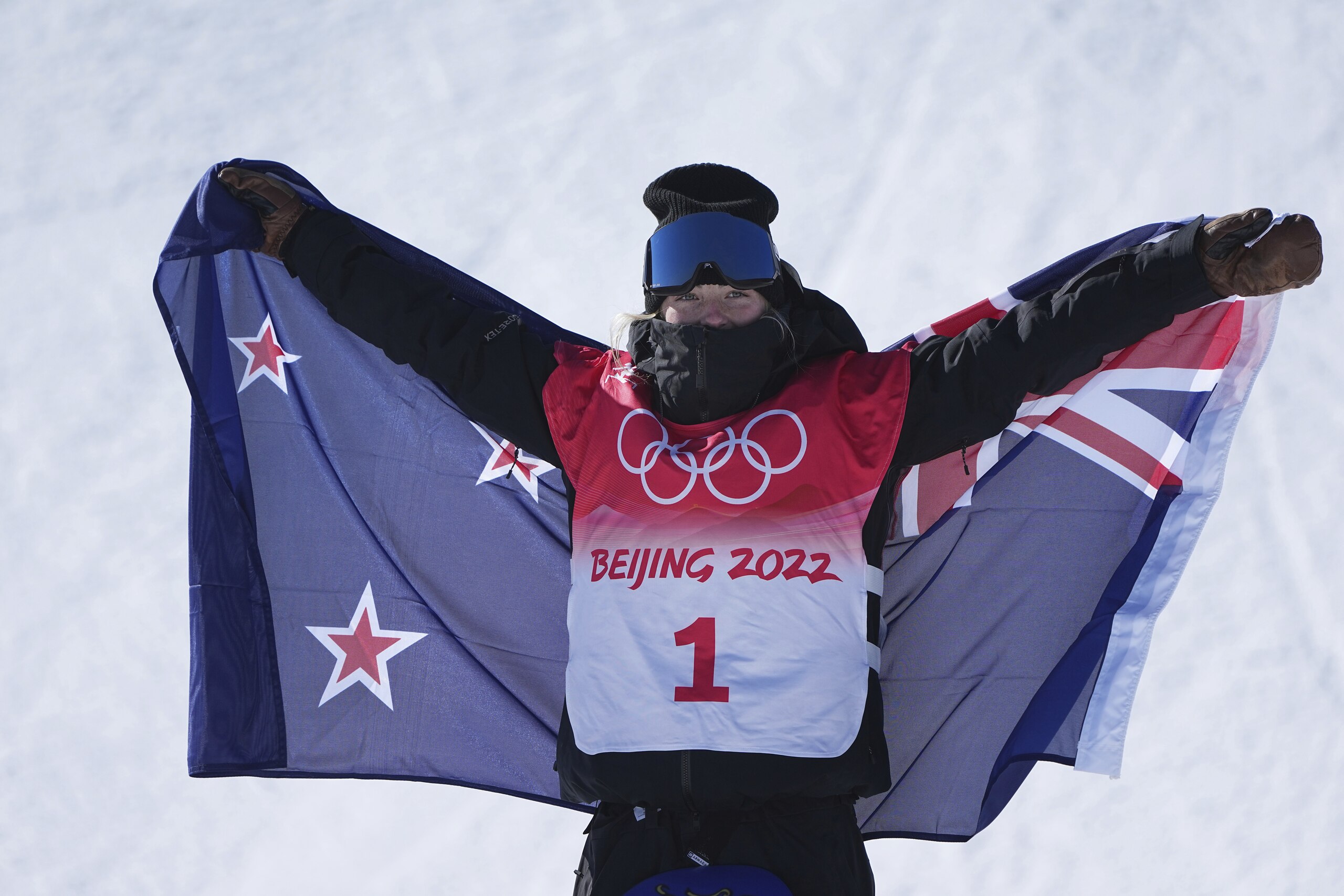 New Zealand's Zoi Sadowski Synnott celebrates after winning a gold medal in the women's slopestyle at the 2022 Winter Olympics, Sunday, Feb. 6, 2022, in Zhangjiakou, China. (AP Photo/Gregory Bull)
