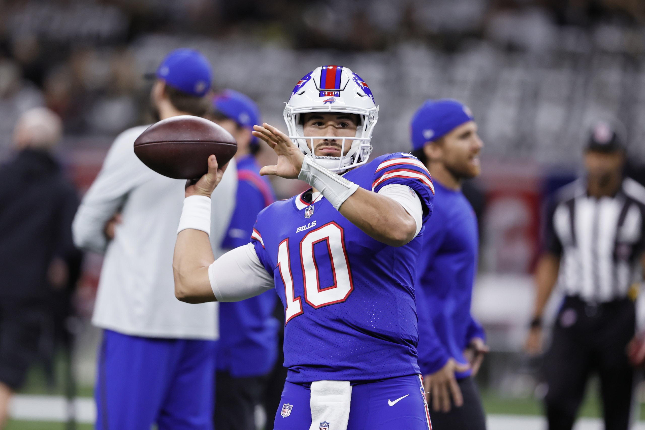 Buffalo Bills quarterback Mitchell Trubisky (10) warms up before an NFL football game against the New Orleans Saints in New Orleans, Thursday, Nov. 25, 2021. (AP Photo/Butch Dill)