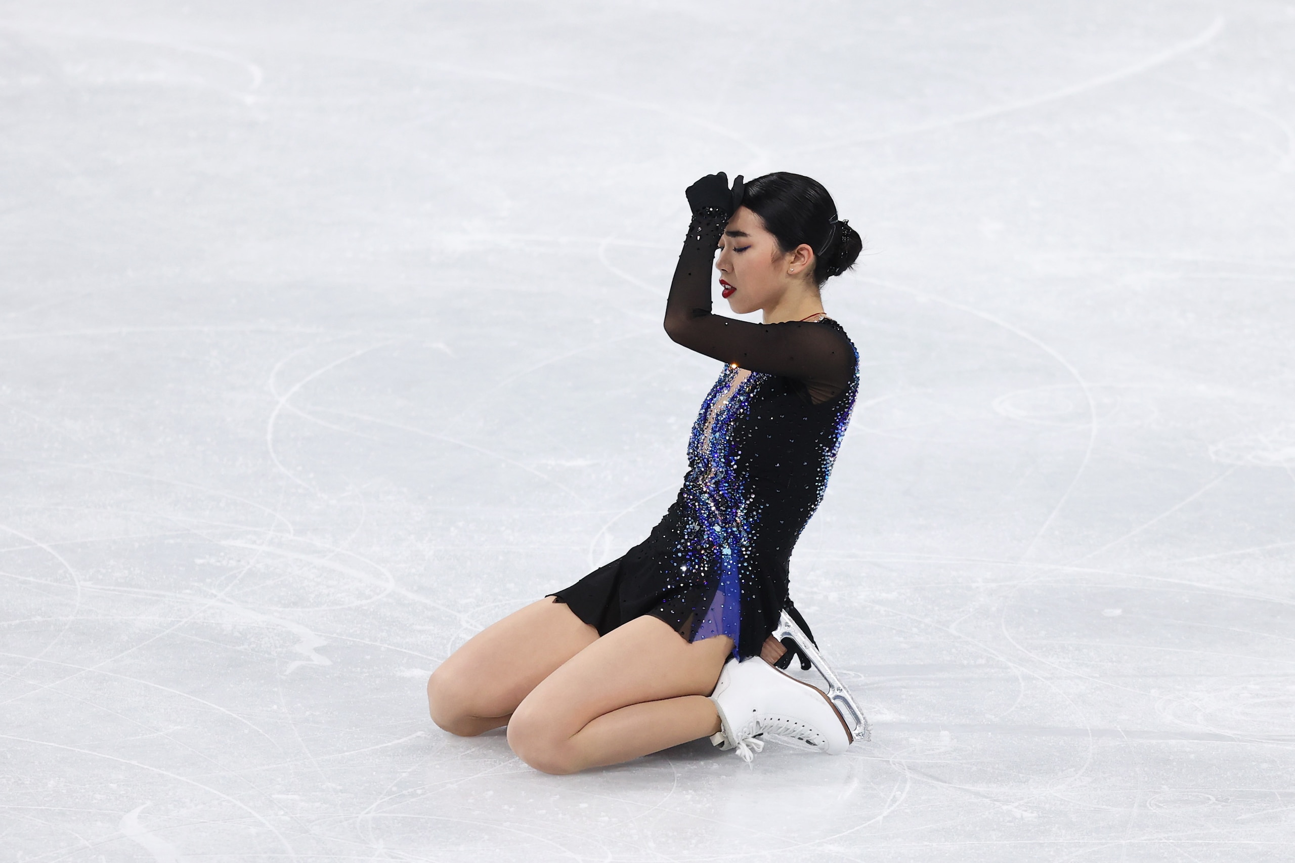BEIJING, CHINA - FEBRUARY 15: Karen Chen of Team United States reacts after skating during the Women Single Skating Short Program on day eleven of the Beijing 2022 Winter Olympic Games at Capital Indoor Stadium on February 15, 2022 in Beijing, China. (Photo by Catherine Ivill/Getty Images)