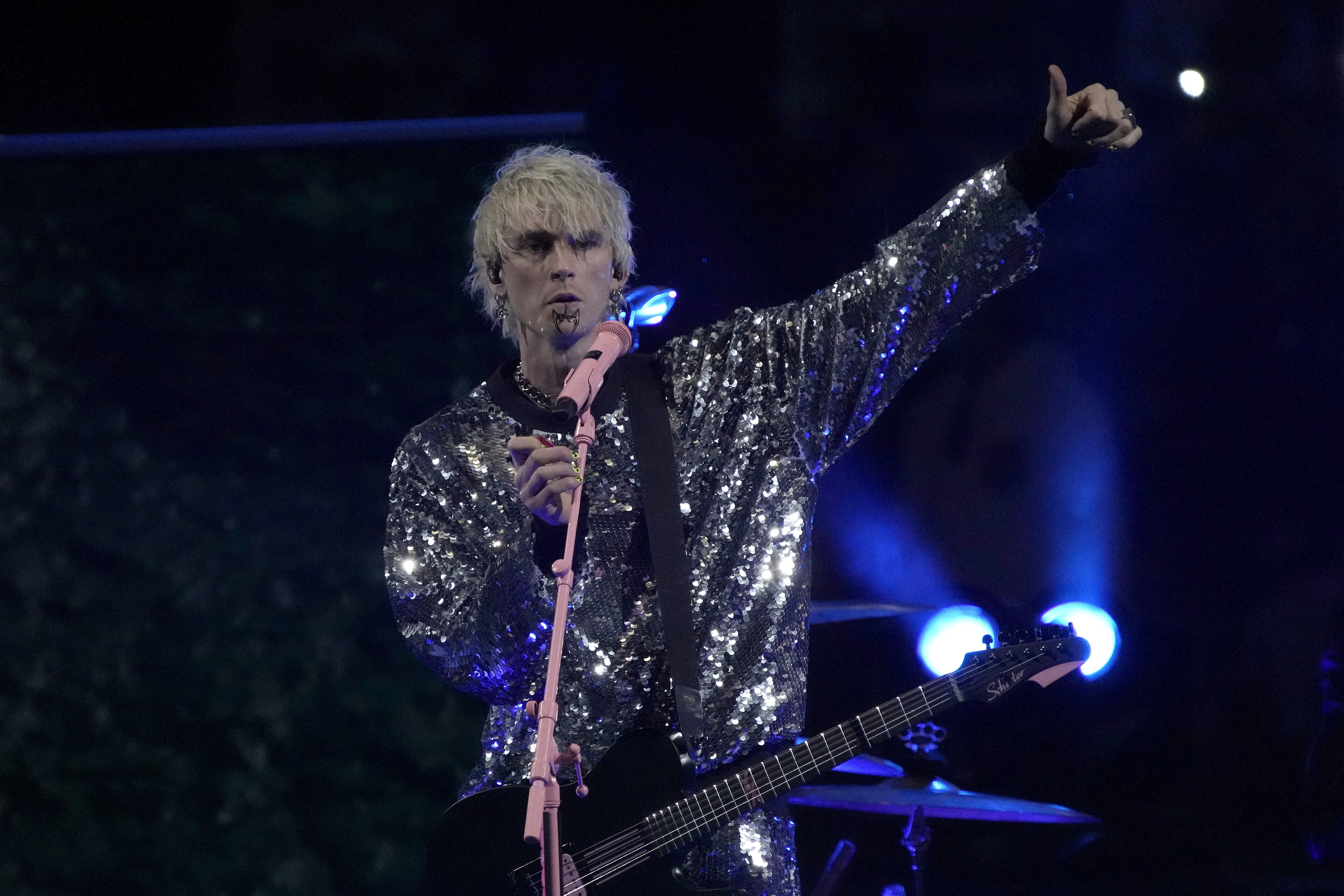 Machine Gun Kelly performs during an intermission at the NHL All-Star hockey game Saturday, Feb. 5, 2022, in Las Vegas. (AP Photo/Rick Scuteri) Machine Gun Kelly performs during an intermission at the NHL All-Star hockey game Saturday, Feb. 5, 2022, in Las Vegas. (AP Photo/Rick Scuteri)