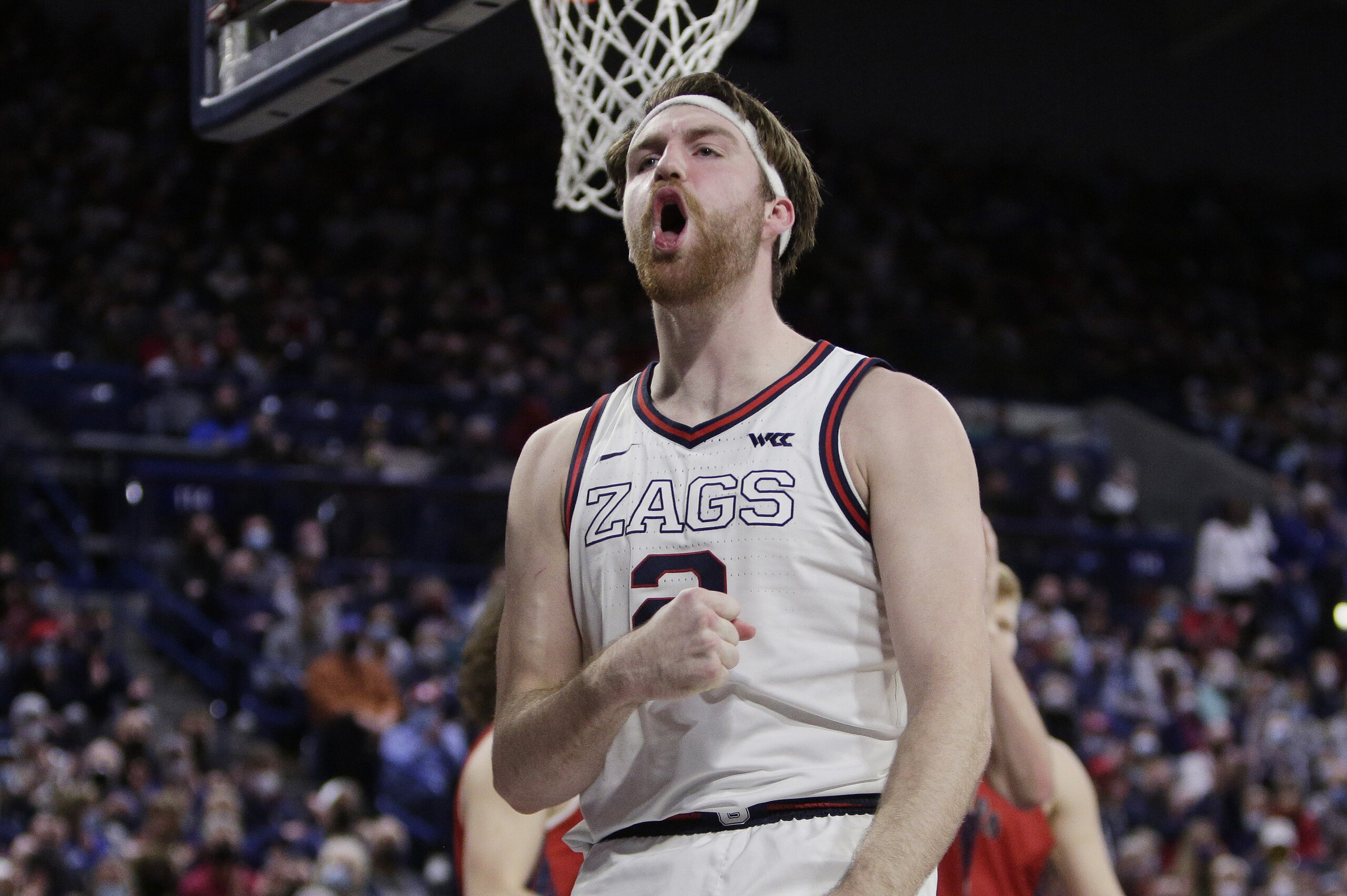 Gonzaga forward Drew Timme celebrates after scoring a basket during the second half of an NCAA college basketball game against Saint Mary's, Saturday, Feb. 12, 2022, in Spokane, Wash. (AP Photo/Young Kwak)