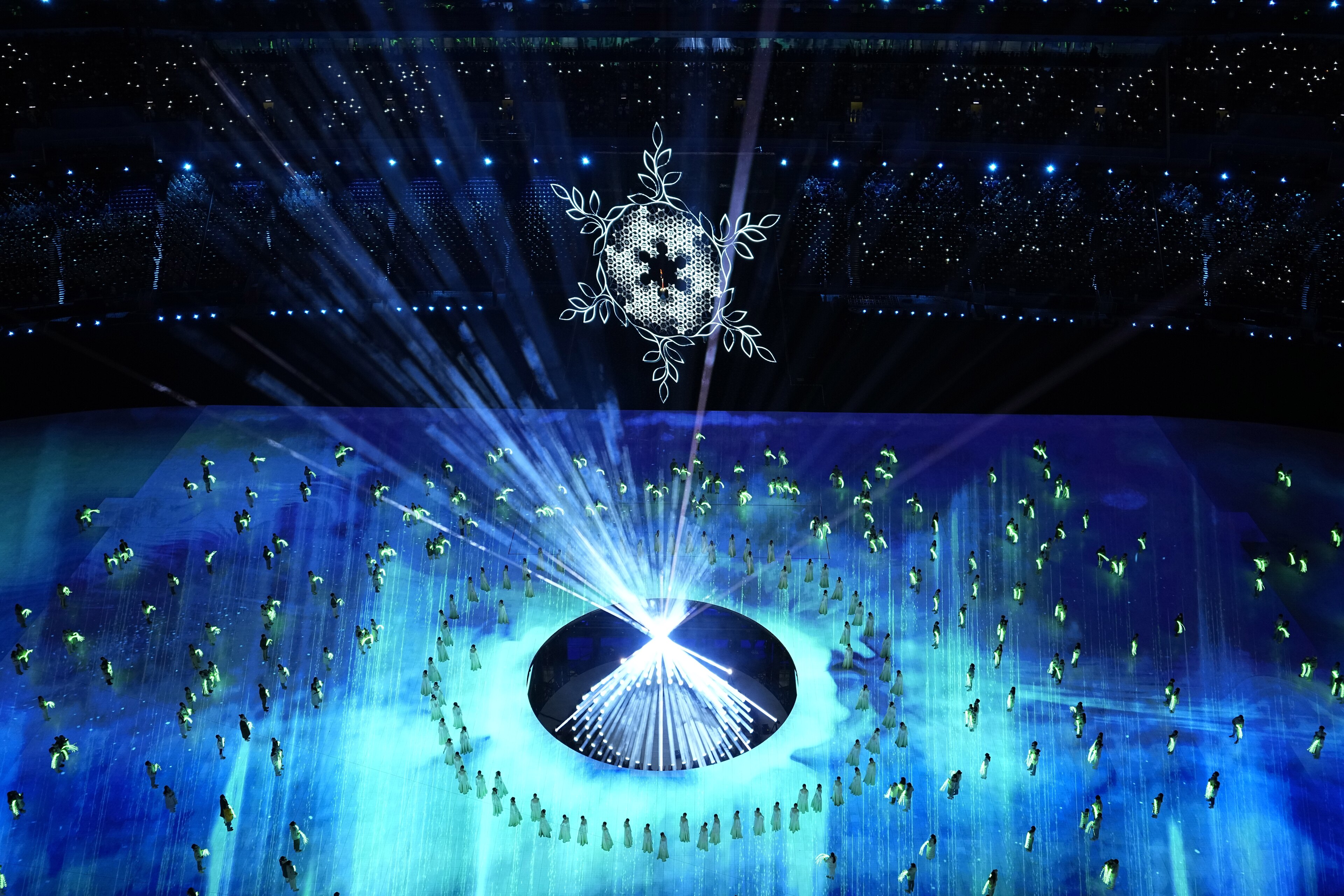 Entertainers perform inside Olympic Stadium during the closing ceremony of the 2022 Winter Olympics, Sunday, Feb. 20, 2022, in Beijing. (AP Photo/Jeff Roberson)