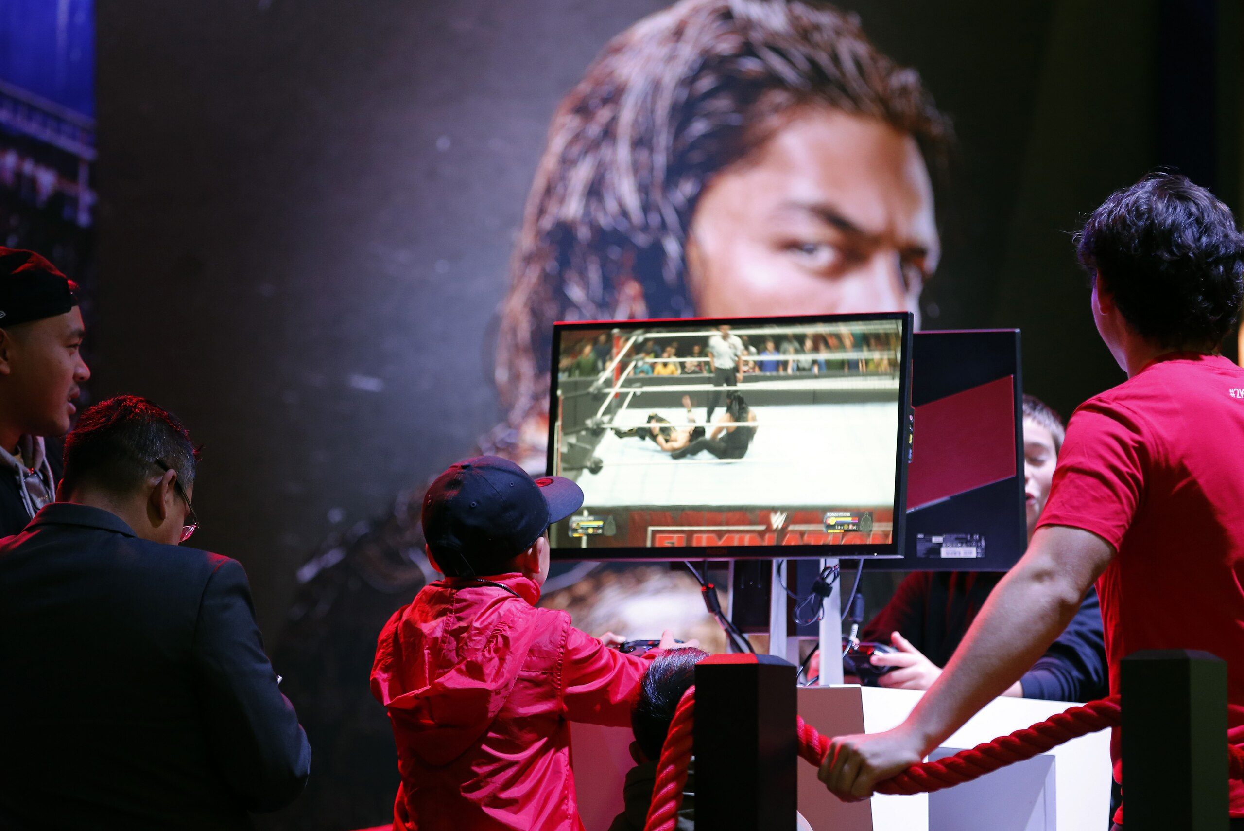 PARIS, FRANCE - OCTOBER 29: A gamer plays the video game 'WWE 2K20' developed and published by 2K Sports during the 'Paris Games Week' on October 29, 2019 in Paris, France. 'Paris Games Week' is an international trade fair for video games that runs from October 29 to November 03, 2019. (Photo by Chesnot/Getty Images)
