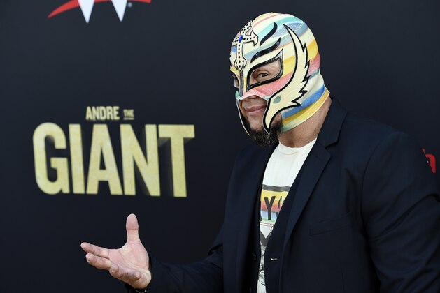 Professional wrestler Rey Mysterio poses at the premiere of the HBO documentary film