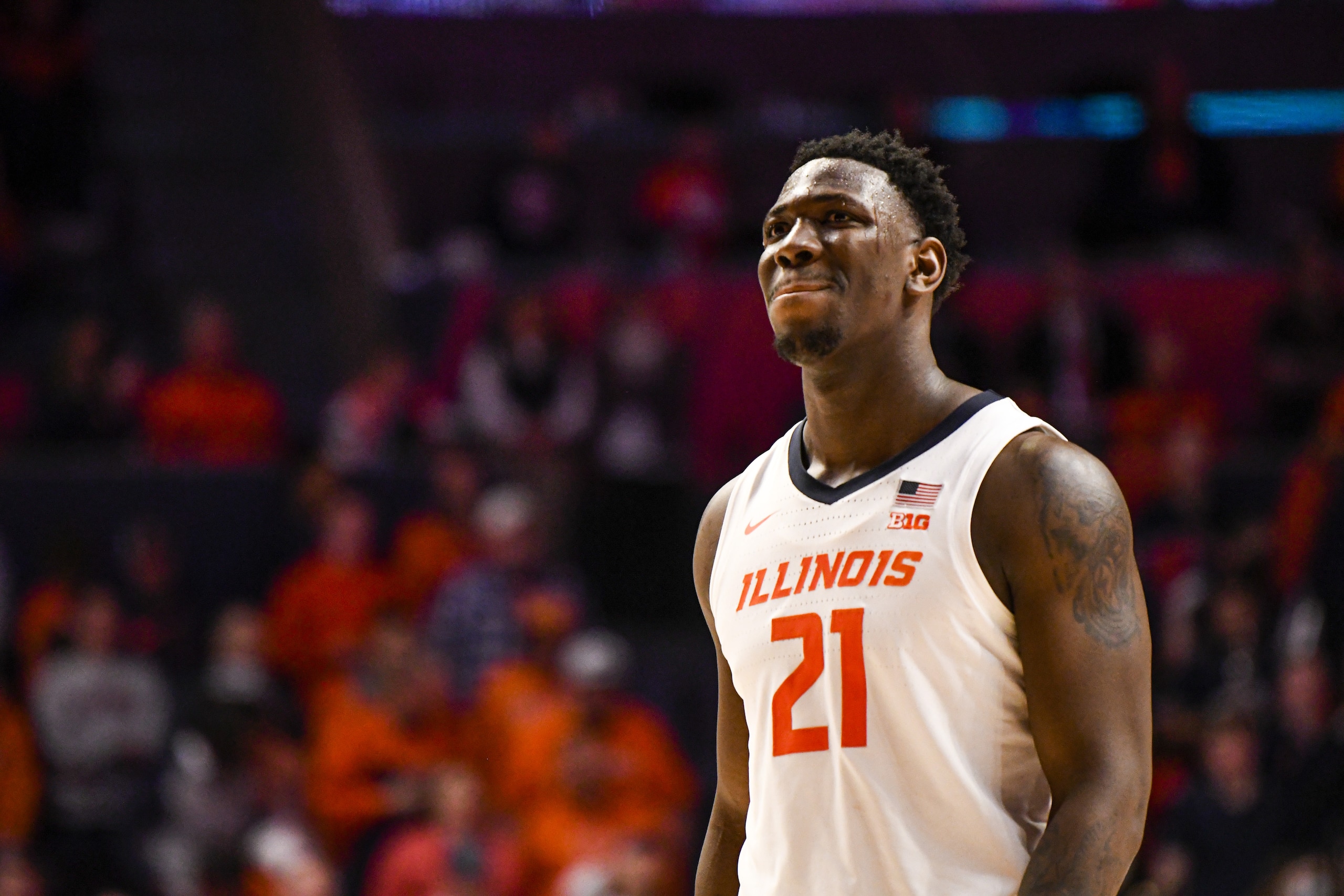 CHAMPAIGN, IL - MARCH 03: Illinois Fighting Illini center Kofi Cockburn (21) looks on during a college basketball game between the Penn State Nittany Lions and the Illinois Fighting Illini on March 3, 2022, at State Farm Center in Champaign, IL. (Photo by Chris Kohley/Icon Sportswire via Getty Images)
