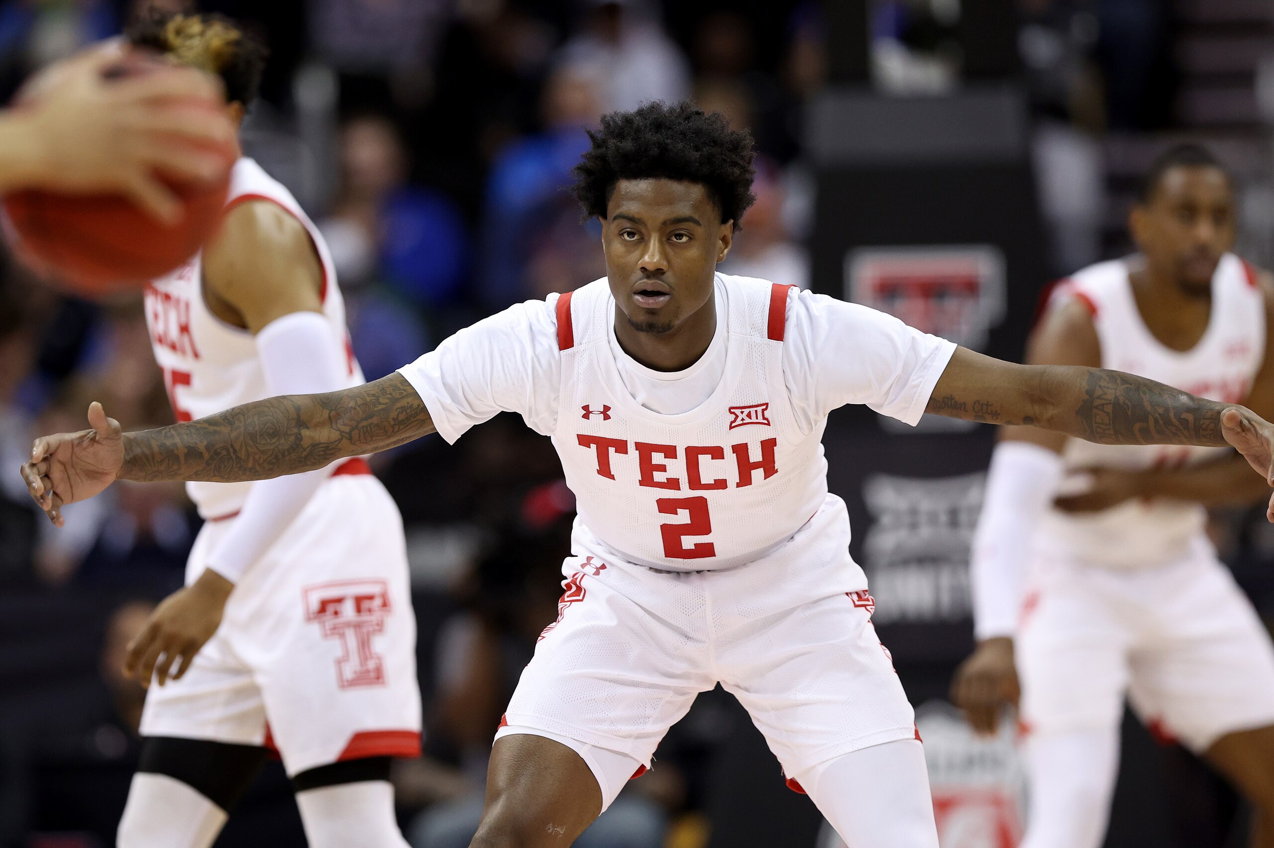 KANSAS CITY, MISSOURI - MARCH 11: Davion Warren #2 of the Texas Tech Red Raiders looks on in the first half against the Oklahoma Sooners during the semifinal game of the 2022 Phillips 66 Big 12 Men's Basketball Championship at T-Mobile Center on March 11, 2022 in Kansas City, Missouri. (Photo by Jamie Squire/Getty Images) KANSAS CITY, MISSOURI - MARCH 11: Davion Warren #2 of the Texas Tech Red Raiders looks on in the first half against the Oklahoma Sooners during the semifinal game of the 2022 Phillips 66 Big 12 Men's Basketball Championship at T-Mobile Center on March 11, 2022 in Kansas City, Missouri. (Photo by Jamie Squire/Getty Images)