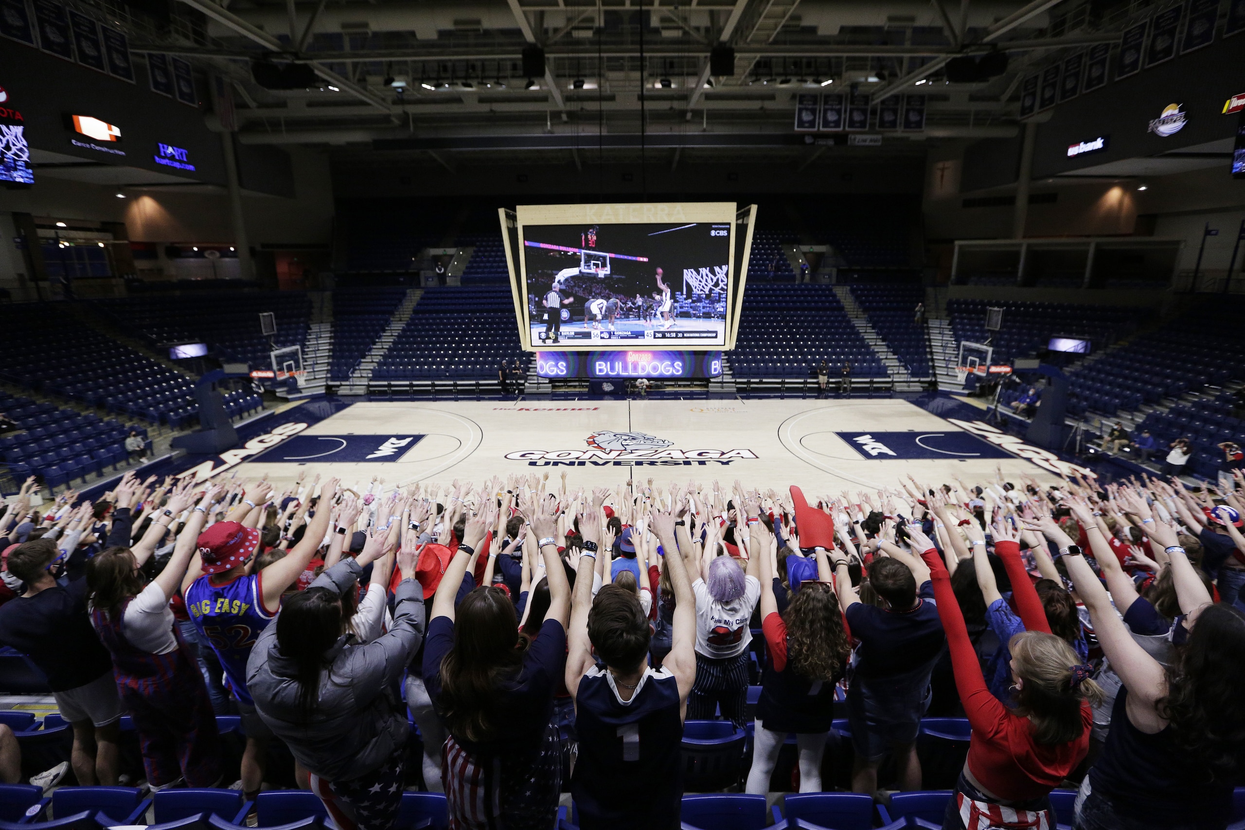 Gonzaga fans react while watching the NCAA Final Four college championship basketball game between Gonzaga and Baylor during a watch party at the McCarthey Athletic Center in Spokane, Wash., Monday, April 5, 2021. (AP Photo/Young Kwak) Gonzaga fans react while watching the NCAA Final Four college championship basketball game between Gonzaga and Baylor during a watch party at the McCarthey Athletic Center in Spokane, Wash., Monday, April 5, 2021. (AP Photo/Young Kwak)