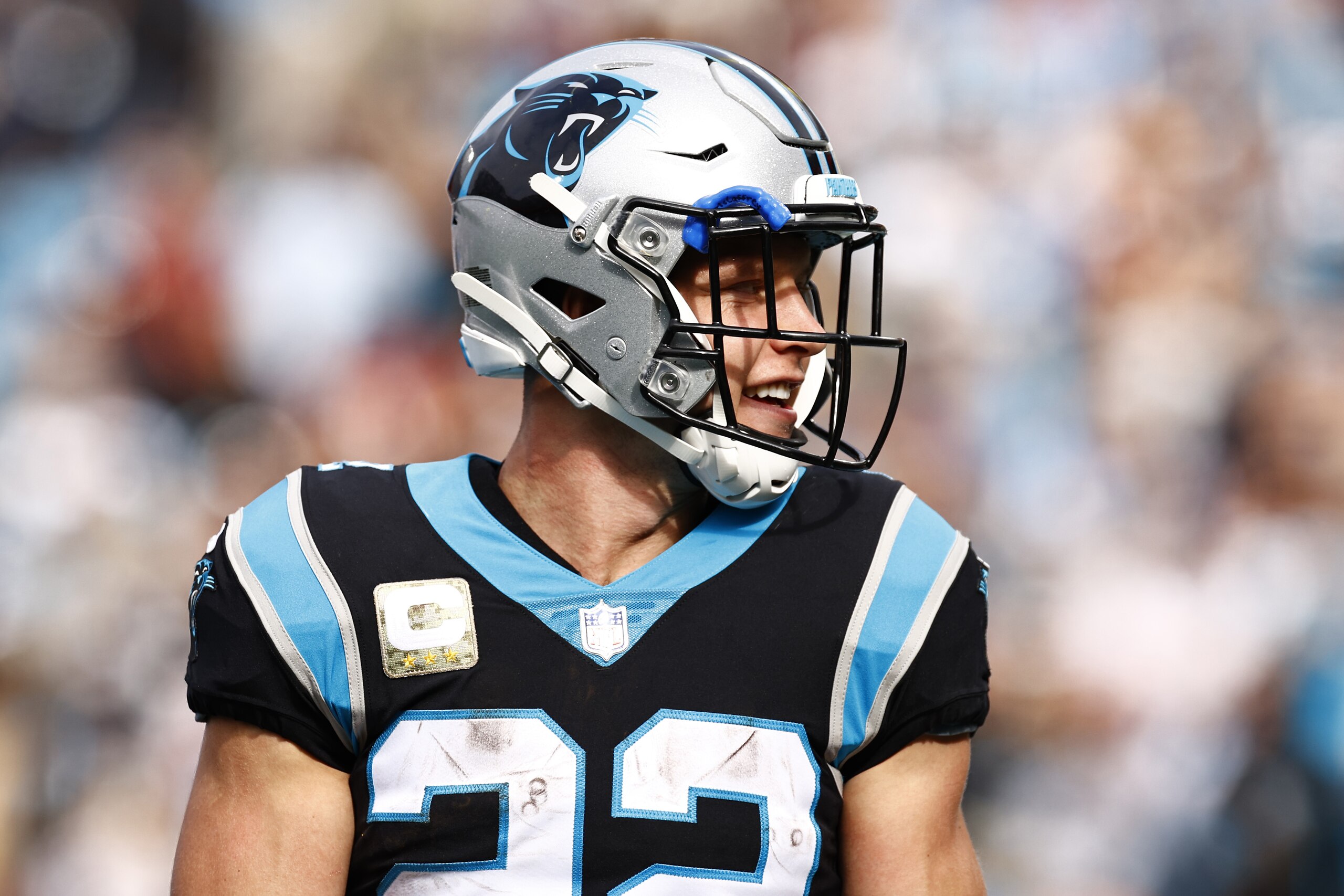 CHARLOTTE, NORTH CAROLINA - NOVEMBER 21: Christian McCaffrey #22 of the Carolina Panthers looks on during the first half of their game against the Washington Football Team at Bank of America Stadium on November 21, 2021 in Charlotte, North Carolina. (Photo by Jared C. Tilton/Getty Images) CHARLOTTE, NORTH CAROLINA - NOVEMBER 21: Christian McCaffrey #22 of the Carolina Panthers looks on during the first half of their game against the Washington Football Team at Bank of America Stadium on November 21, 2021 in Charlotte, North Carolina. (Photo by Jared C. Tilton/Getty Images)