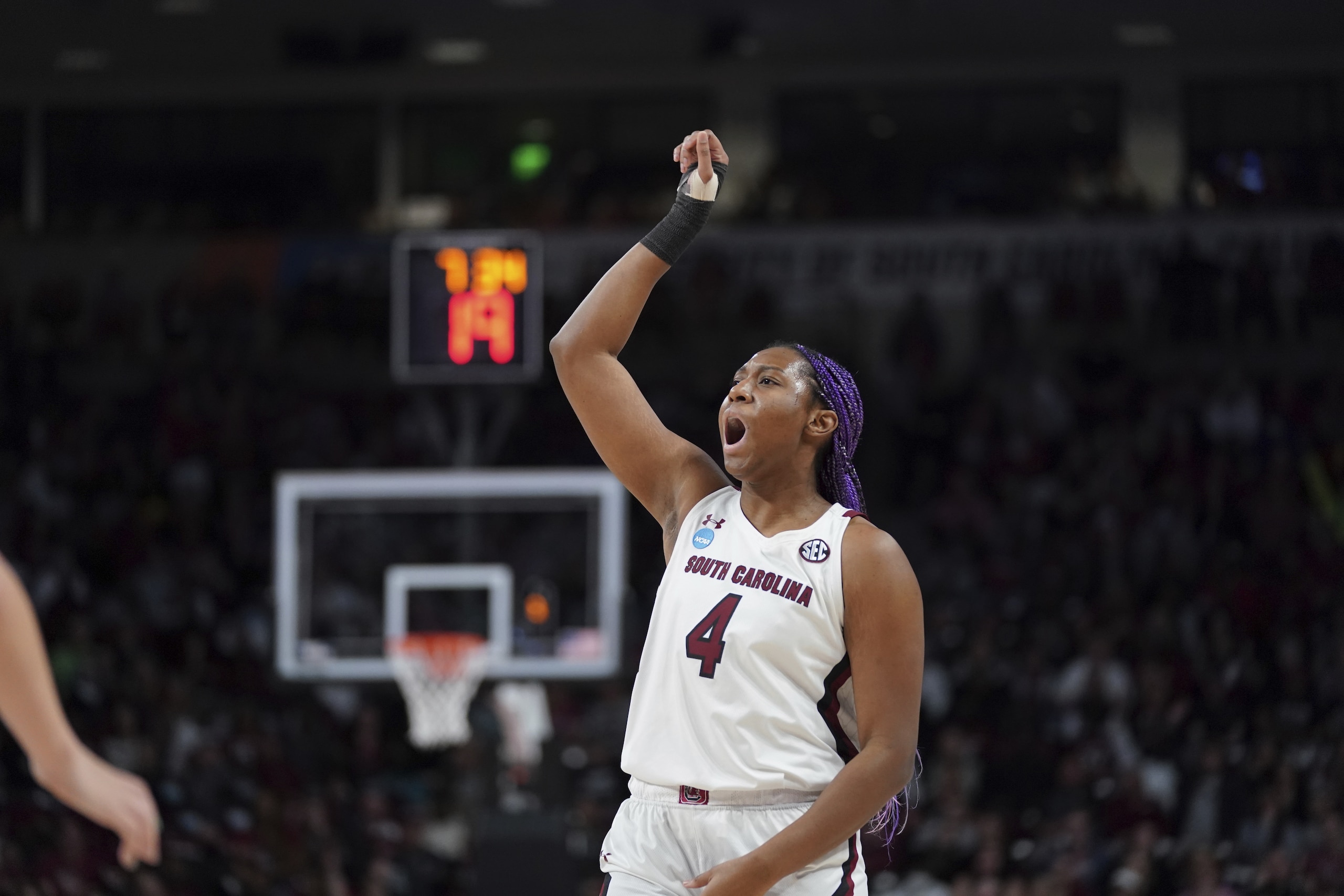 South Carolina forward Aliyah Boston reacts after shooting an air ball during the first half a second-round game against Miami in the NCAA college basketball tournament Sunday, March 20, 2022 in Columbia, S.C. South Carolina won 49-33. (AP Photo/Sean Rayford)