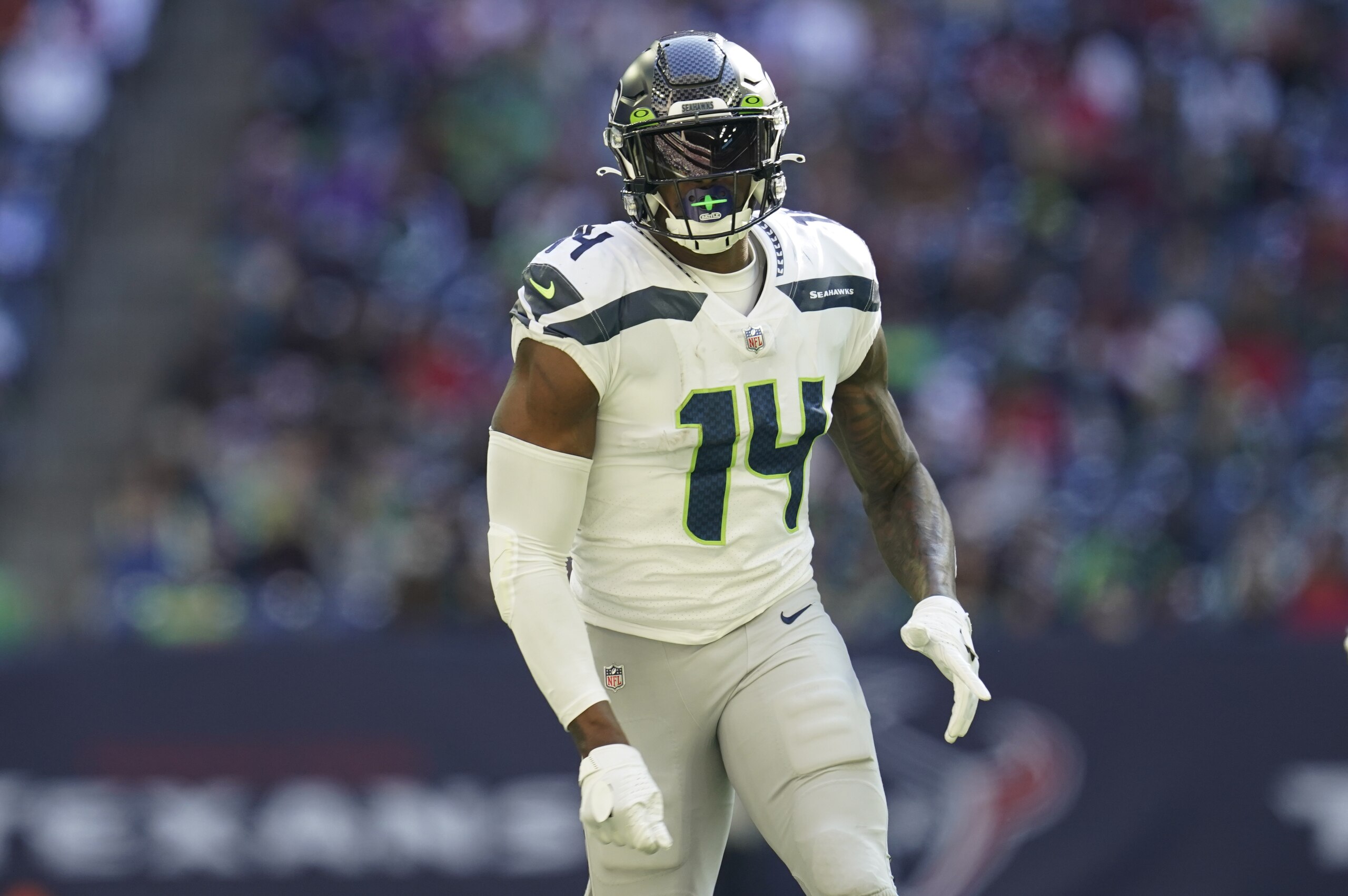 Seattle Seahawks wide receiver DK Metcalf (14) runs a pass route during an NFL football game against the Houston Texans, Sunday, Dec. 12, 2021, in Houston. (AP Photo/Matt Patterson)