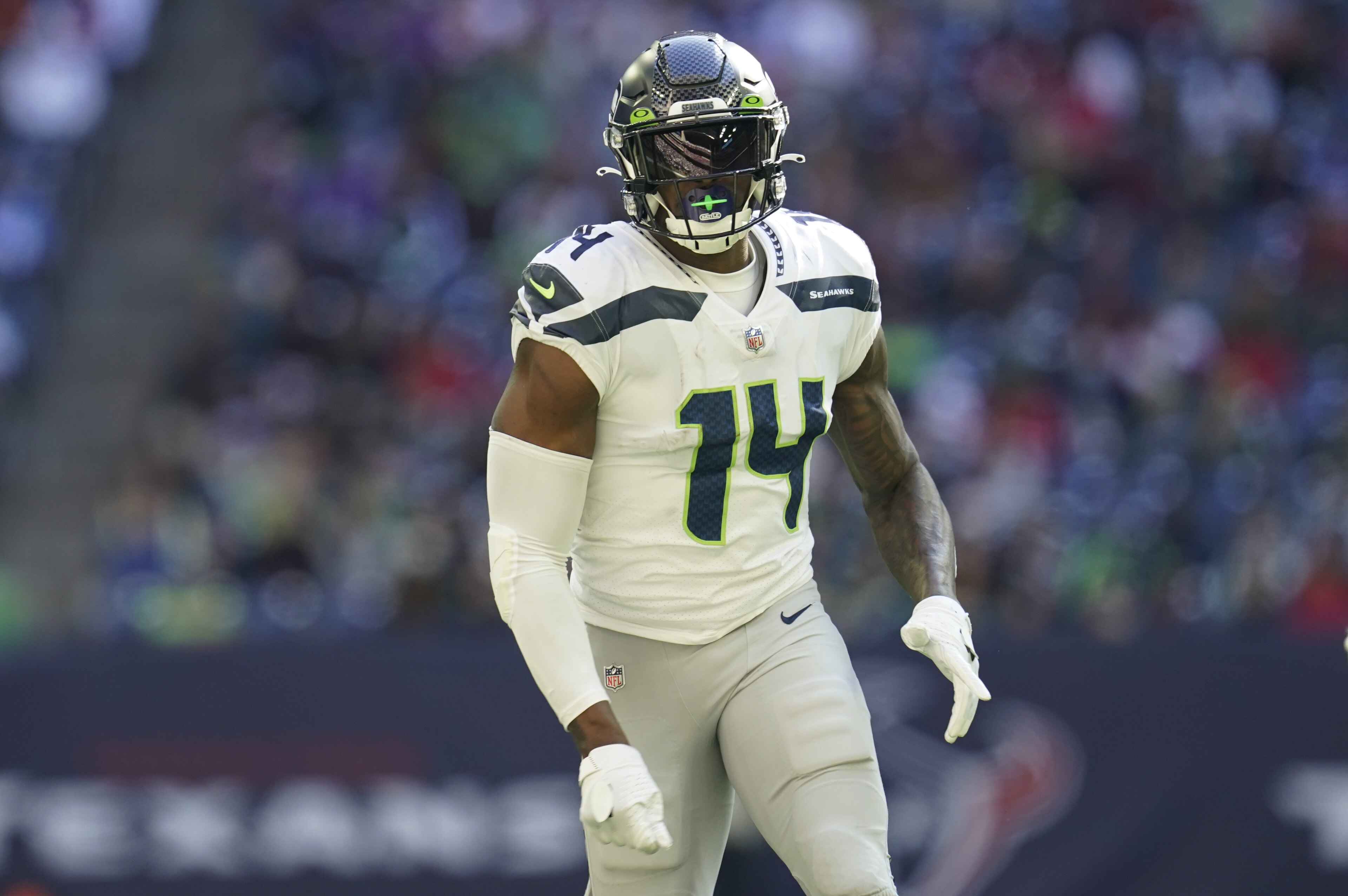 Seattle Seahawks wide receiver DK Metcalf (14) runs a pass route during an NFL football game against the Houston Texans, Sunday, Dec. 12, 2021, in Houston. (AP Photo/Matt Patterson)