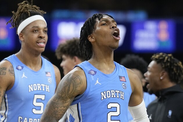 North Carolina's Caleb Love (2) celebrates after North Carolina's win against Duke in a college basketball game during the semifinal round of the Men's Final Four NCAA tournament, Saturday, April 2, 2022, in New Orleans.(AP Photo/Brynn Anderson)
