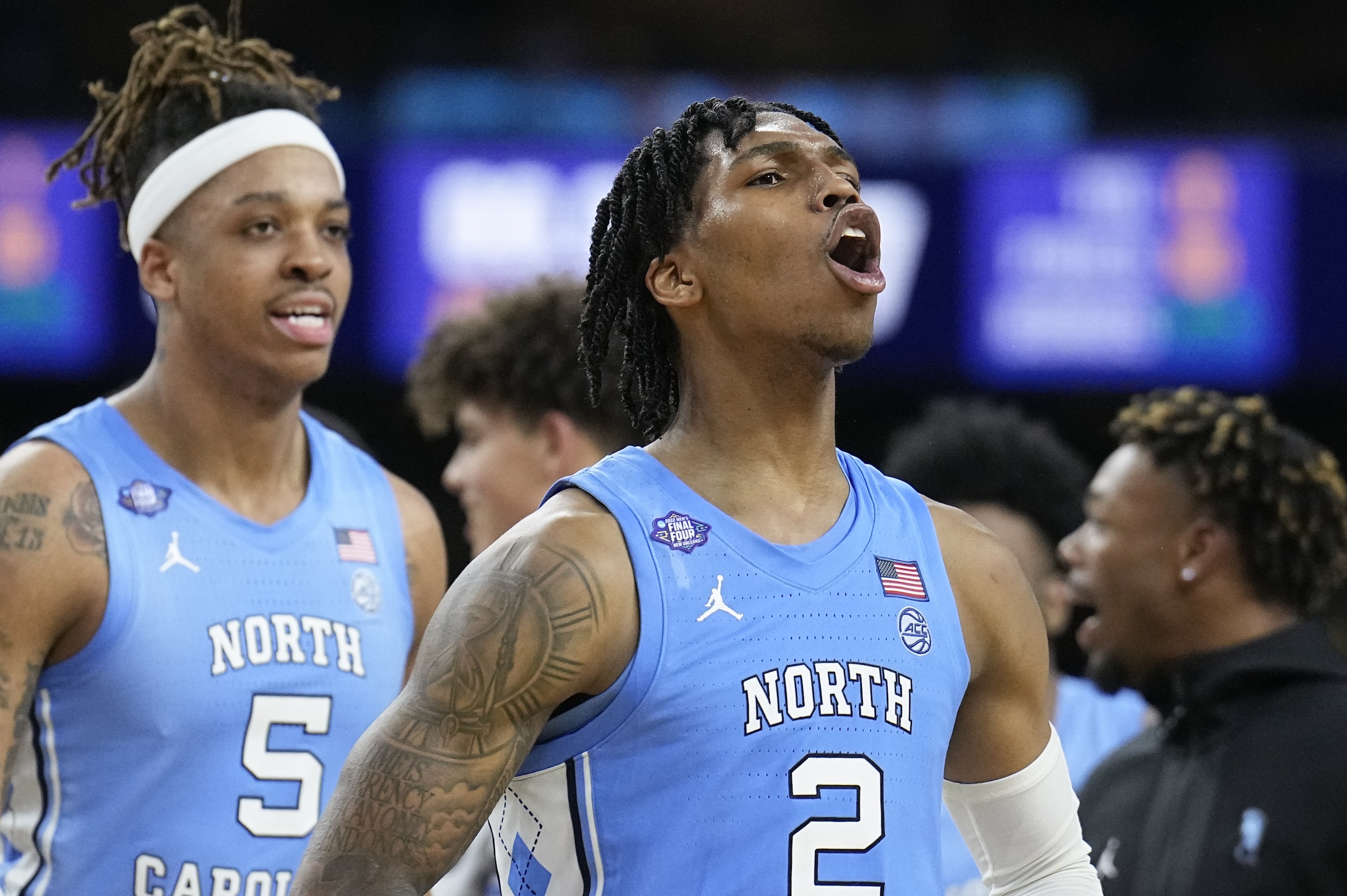 North Carolina's Caleb Love (2) celebrates after North Carolina's win against Duke in a college basketball game during the semifinal round of the Men's Final Four NCAA tournament, Saturday, April 2, 2022, in New Orleans.(AP Photo/Brynn Anderson)