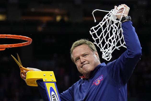 Kansas head coach Bill Self cuts the net after their win against North Carolina in a college basketball game at the finals of the Men's Final Four NCAA tournament, Monday, April 4, 2022, in New Orleans. (AP Photo/Brynn Anderson)