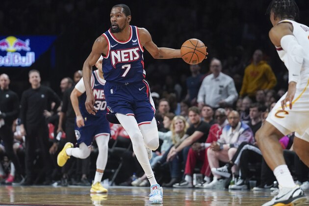 Brooklyn Nets forward Kevin Durant (7) dribbles down court during the second half of an NBA basketball game against the Cleveland Cavaliers Friday April 8, 2022, in New York. (AP Photo/Bebeto Matthews)