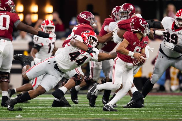 INDIANAPOLIS, IN - JANUARY 10: Georgia Bulldogs DL Travon Walker (44) gets pressure on Alabama Crimson Tide QB Bryce Young (9) during the Alabama Crimson Tide versus the Georgia Bulldogs in the College Football Playoff National Championship, on January 10, 2022, at Lucas Oil Stadium in Indianapolis, IN. (Photo by Zach Bolinger/Icon Sportswire via Getty Images)