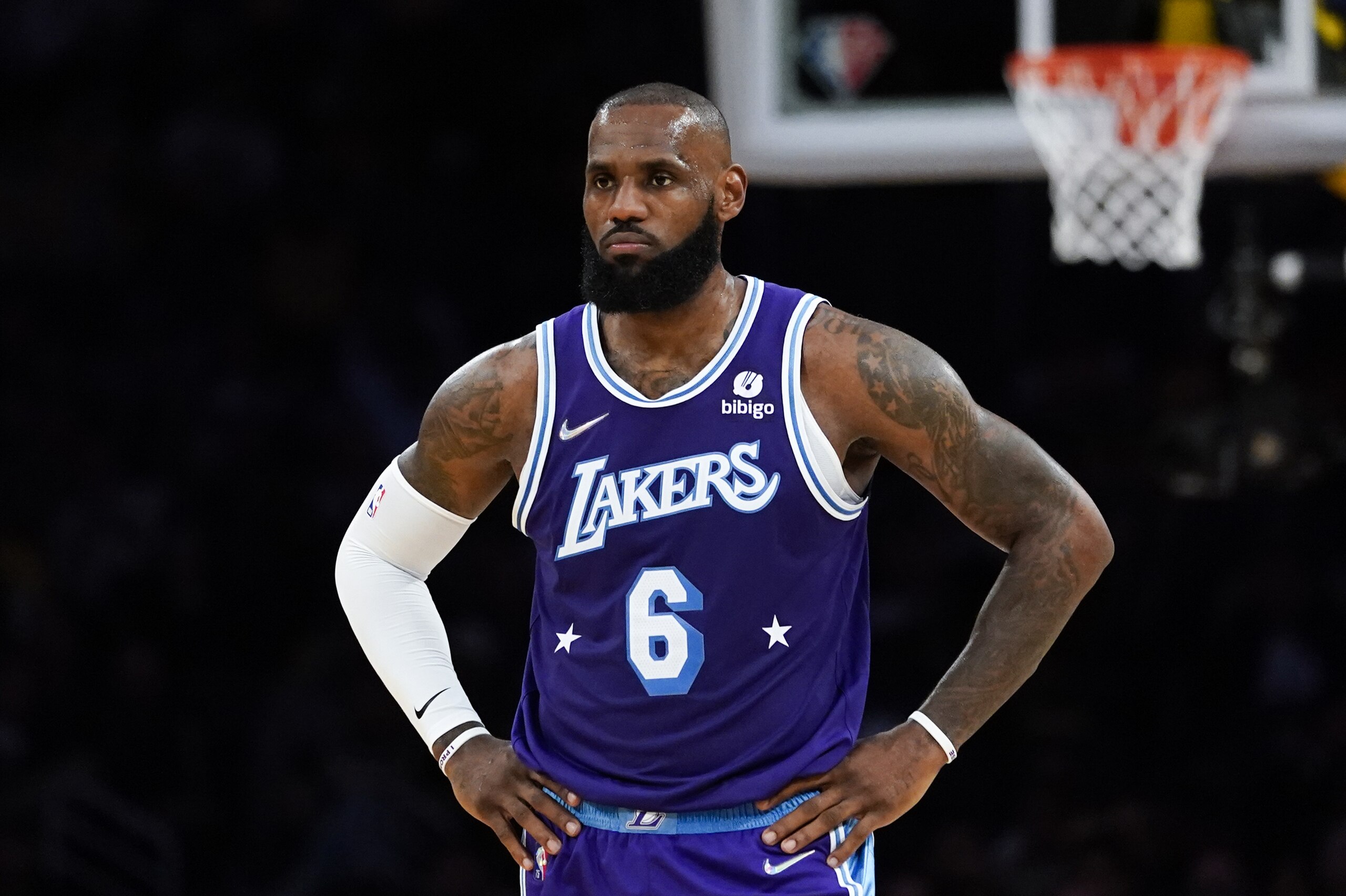 Los Angeles Lakers forward LeBron James (6) stands on the court during an NBA basketball game against the New Orleans Pelicans in Los Angeles, Friday, April 1, 2022. (AP Photo/Ashley Landis)