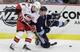 Pittsburgh Penguins' Jordan Staal (11) collides with Carolina Hurricanes' Jaroslav Spacek (8) in the first period of an NHL hockey game in Pittsburgh Tuesday, Dec. 27, 2011. (AP Photo/Gene J. Puskar)