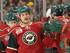 Minnesota Wild's Kyle Brodziak is congratulated by teammates after he scored in the first period against the San Jose Sharks in an NHL hockey game in St. Paul, Minn., Wednesday, Dec. 29, 2010. (AP Photo/Andy King)