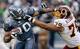 Seattle Seahawks' Maurice Morris (20) pushes off Washington Redskins' Lorenzo Alexander in the second half of an NFL football game Sunday, Nov. 23, 2008, in Seattle. The Redskins won 20-17. (AP Photo/Elaine Thompson)