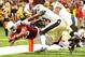 Alfonso Smith (left) scores Arizona's lone touchdown against New Orleans.