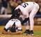 An emotional Rivera collapses on the mound in joy after the Yankees win Game 7 of the ALCS against Boston in 2003