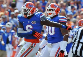 Defensive end Dante Fowler celebrates a Florida stop against Tennessee.