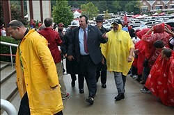 Bret Bielema walks up to the stadium prior to Arkansas' matchup versus Texas A&M.
