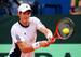 Wimbledon champion Andy Murray uses his Head during a 2013 Davis Cup tie.