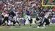 BALTIMORE, MD - SEPTEMBER 22: Quarterback Joe Flacco #5 of the Baltimore Ravens gets off a pass against the Houston Texans during the second half of the Ravens 30-9 win at M&T Bank Stadium on September 22, 2013 in Baltimore, Maryland. (Photo by Rob Carr