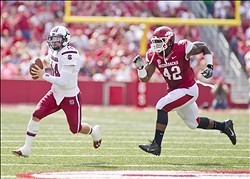 (Right) DE Chris Smith