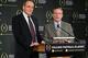 CFP Executive Dir. Bill Hancock (left) and Arkansas AD Jeff Long