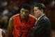Travis Ford, right, and Marcus Smart debut at No. 12 in the preseason coaches poll.