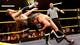 Dallas hits Zayn with a spear. (Photo: WWE.com)