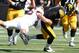 Mike Rallis makes a tackle for the Golden Gophers.